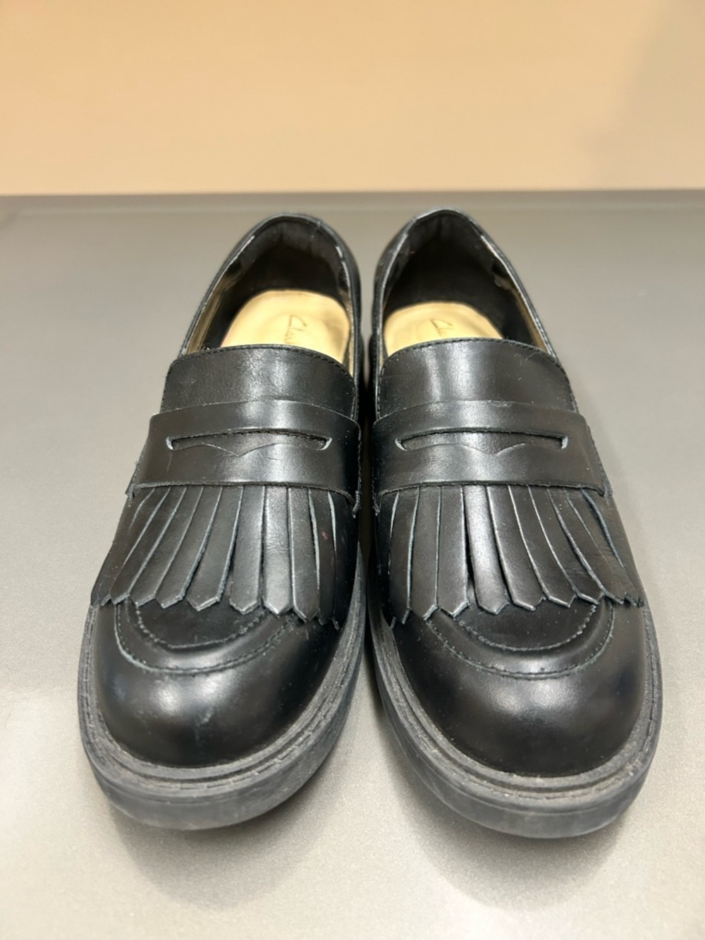Clarks Black Leather Fringe Penny Loafers - Women's Flats